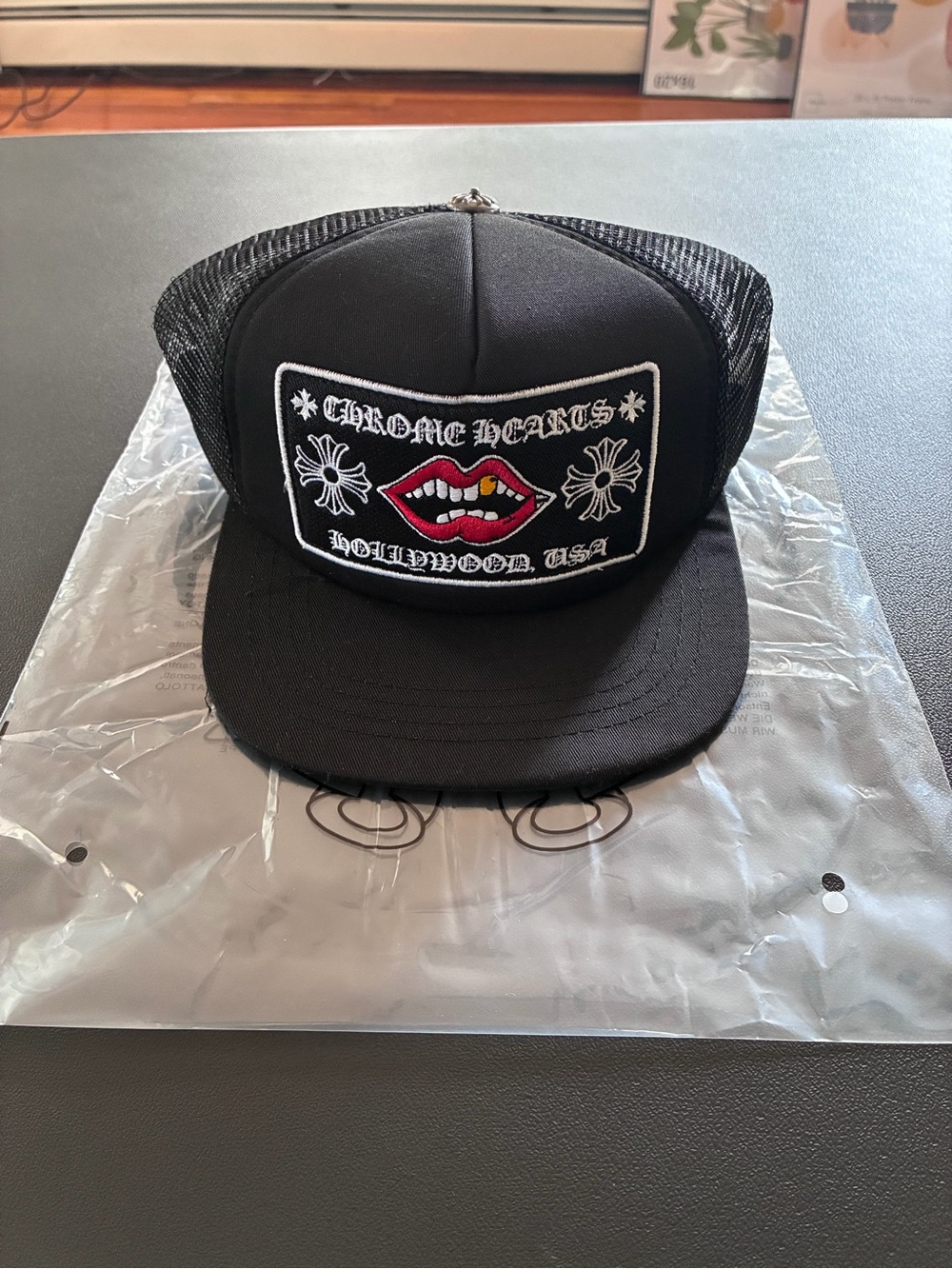 CH Black Trucker Hat with Red Lip Patch and White Embroidery